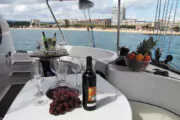 Set the mood on board a private catamaran in Barcelona