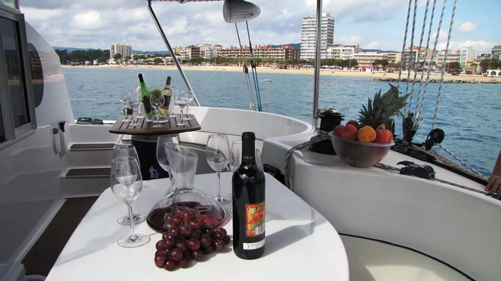 Set the mood on board a private catamaran in Barcelona