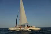 People on board a catamaran in Barcelona